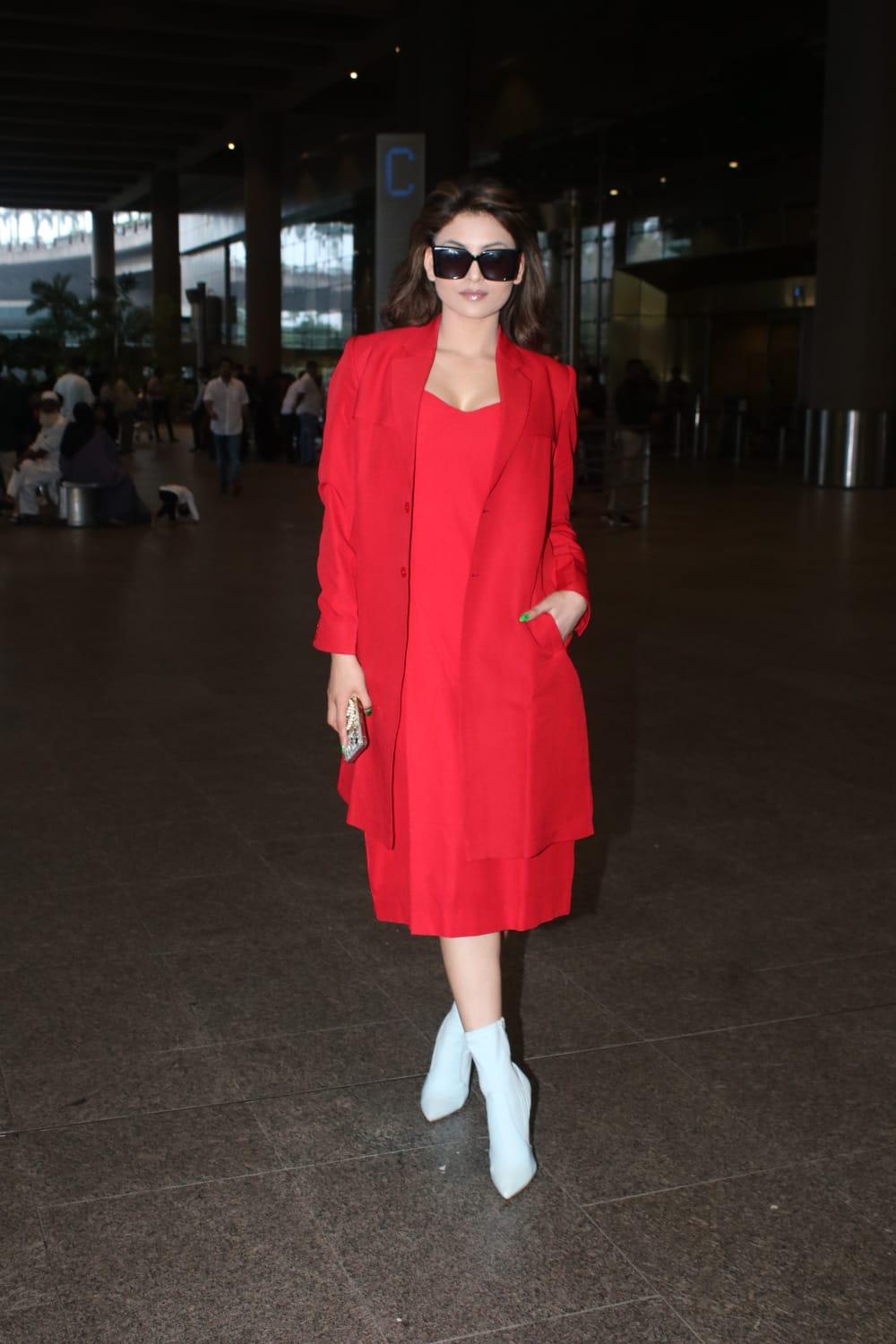 She was donning an all-red ensemble that exuded confidence and style.